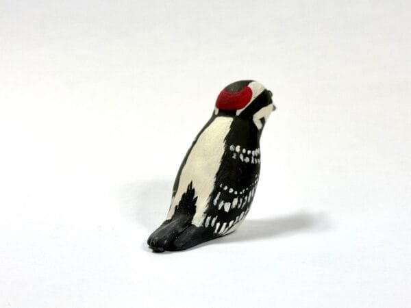 Clay woodpecker totem from Featherlight Talimals series