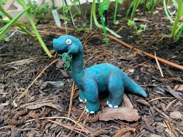 Cute clay Brontosaurus from Jurassic Zubaloo series, eating leaves