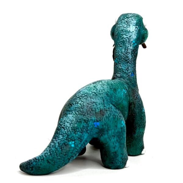 Handmade Jurassic Zubaloo Brontosaurus in green polymer clay with leaves