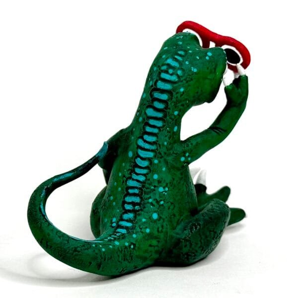 Cute clay velociraptor from Jurassic Zubaloo series, wearing glasses